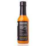 Back view of Sauce Bae Hotter Habanero Hot Sauce bottle showing nutrition facts, ingredients list, and product claims. Highlights include 0 calories per serving, clean ingredients like pineapple, turmeric, habanero, and ghost pepper, and branding for vegan, gluten-free, preservative-free sauce. Bottle shown on a white background.